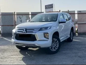 Mitsubishi  Pajero  Montero Sport  2023  Automatic  0 Km  6 Cylinder  Four Wheel Drive (4WD)  SUV  White  With Warranty