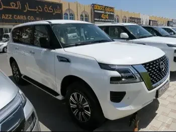 Nissan  Patrol  XE  2023  Automatic  0 Km  6 Cylinder  Four Wheel Drive (4WD)  SUV  White  With Warranty