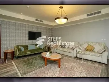 2 Bedrooms  Apartment  For Rent  in Doha -  The Pearl  Fully Furnished