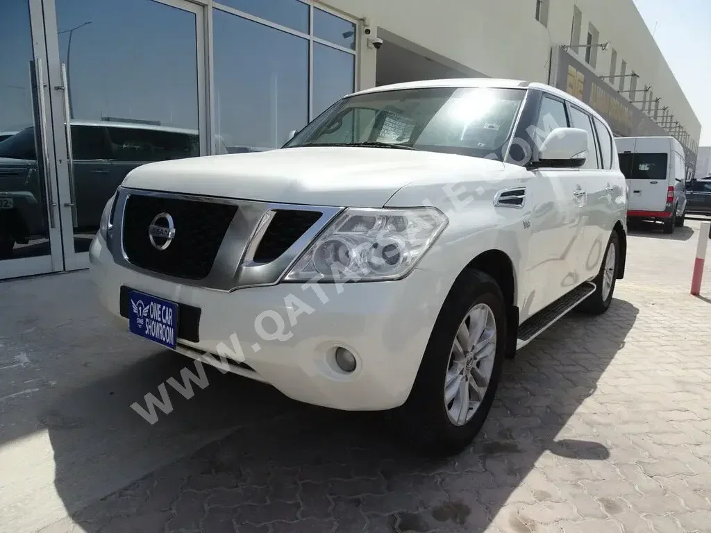 Nissan  Patrol  SE  2013  Automatic  192,000 Km  8 Cylinder  Four Wheel Drive (4WD)  SUV  White  With Warranty