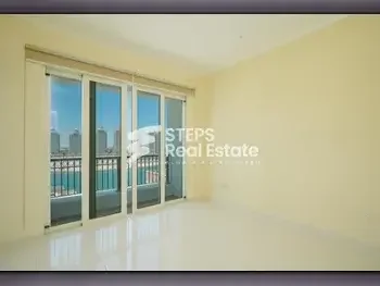 3 Bedrooms  Apartment  For Rent  in Doha -  The Pearl  Semi Furnished