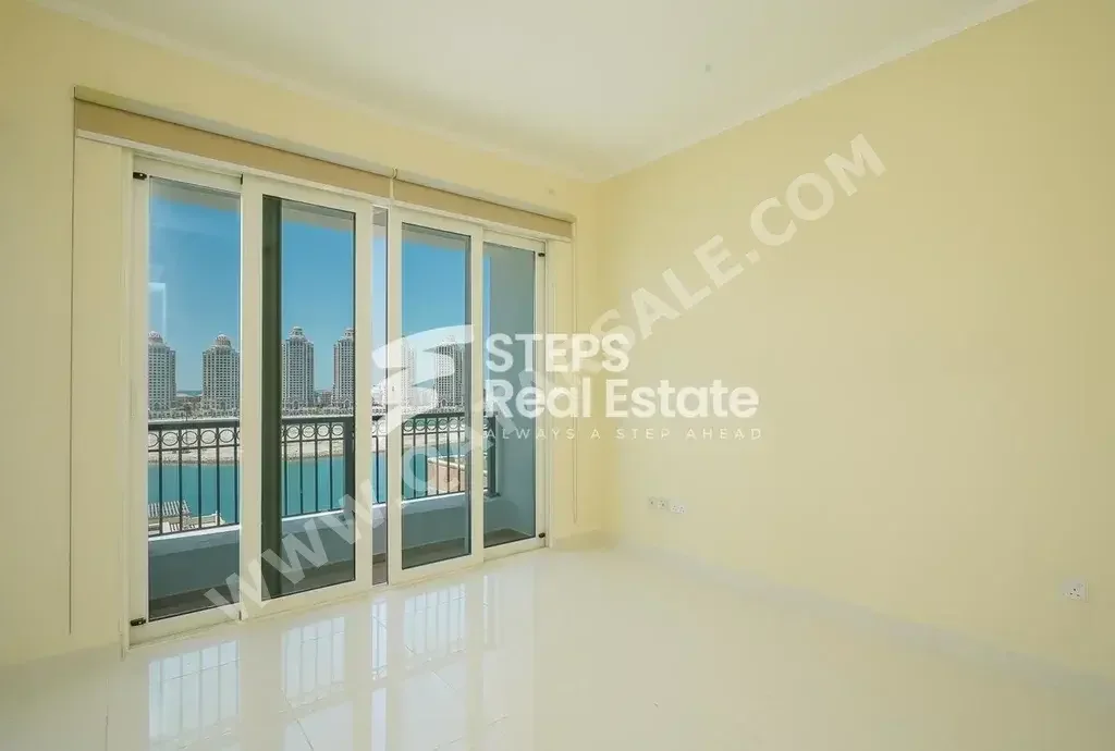 3 Bedrooms  Apartment  For Rent  in Doha -  The Pearl  Semi Furnished