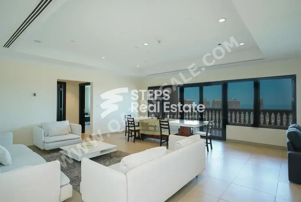 2 Bedrooms  Apartment  For Rent  in Doha -  The Pearl  Fully Furnished