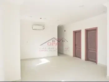 2 Bedrooms  Apartment  For Rent  in Doha -  Al Mansoura  Not Furnished