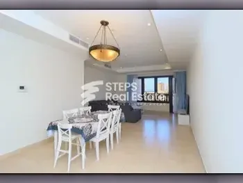 2 Bedrooms  Apartment  For Rent  in Doha -  The Pearl  Fully Furnished