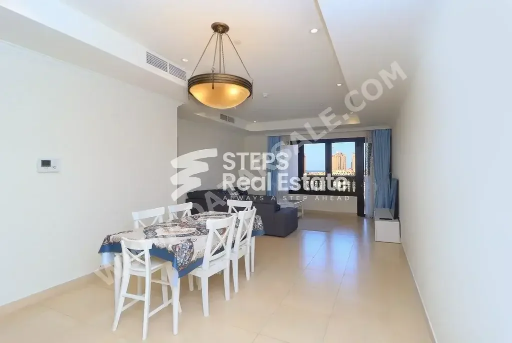 2 Bedrooms  Apartment  For Rent  in Doha -  The Pearl  Fully Furnished