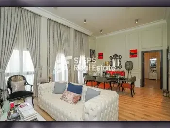 2 Bedrooms  Apartment  For Rent  in Doha -  The Pearl  Fully Furnished