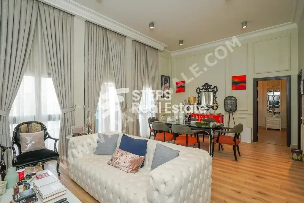 2 Bedrooms  Apartment  For Rent  in Doha -  The Pearl  Fully Furnished