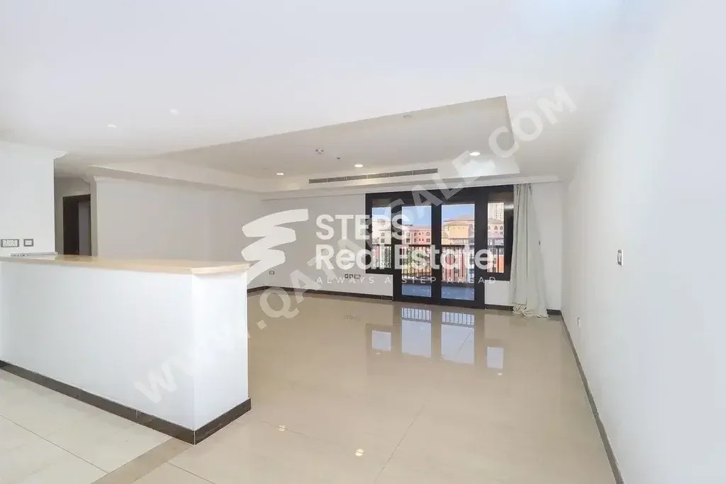 2 Bedrooms  Apartment  For Rent  in Doha -  The Pearl  Semi Furnished