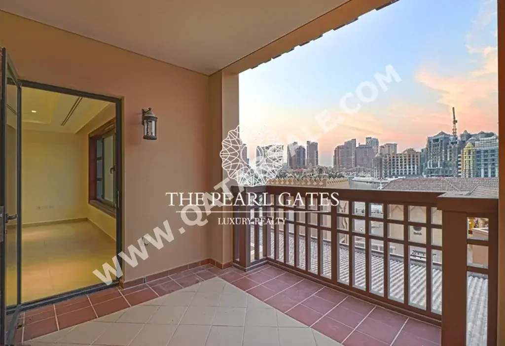 2 Bedrooms  Apartment  For Rent  in Doha -  The Pearl  Semi Furnished