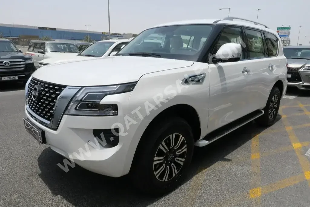 Nissan  Patrol  SE  2023  Automatic  0 Km  6 Cylinder  Four Wheel Drive (4WD)  SUV  White  With Warranty