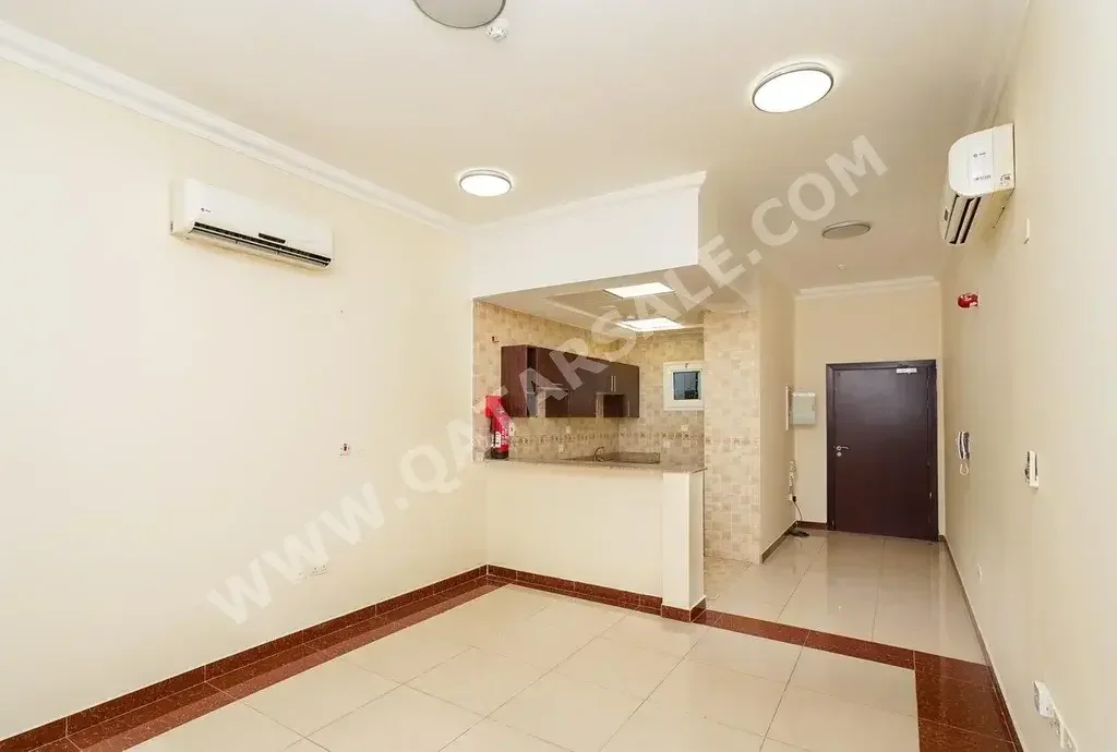 2 Bedrooms  Apartment  in Doha -  Al Mansoura  Not Furnished