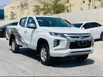  Mitsubishi  L 200  2020  Manual  117,000 Km  4 Cylinder  Rear Wheel Drive (RWD)  Pick Up  White  With Warranty