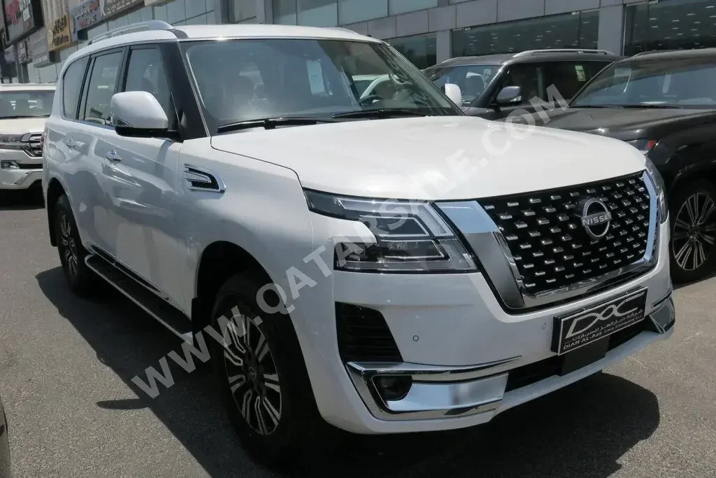 Nissan  Patrol  Titanium  2023  Automatic  0 Km  6 Cylinder  Four Wheel Drive (4WD)  SUV  White  With Warranty