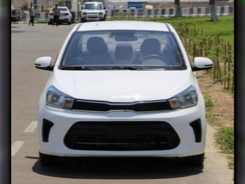 Kia  Pegas  4 Cylinder  Sedan  White  2024