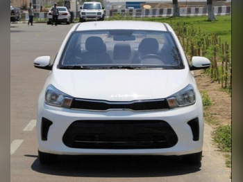 Kia  Pegas  4 Cylinder  Sedan  White  2024