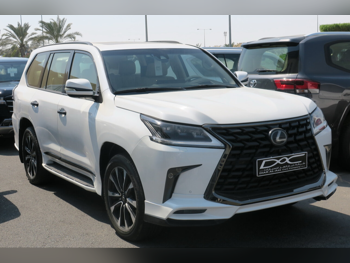 Lexus  LX  570 S Black Edition  2021  Automatic  128,000 Km  8 Cylinder  Four Wheel Drive (4WD)  SUV  White  With Warranty