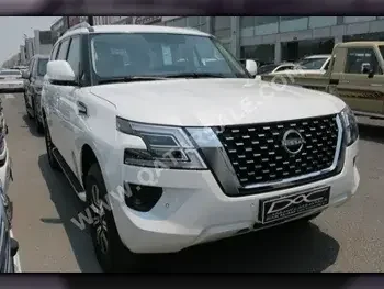 Nissan  Patrol  SE  2023  Automatic  0 Km  6 Cylinder  Four Wheel Drive (4WD)  SUV  White  With Warranty