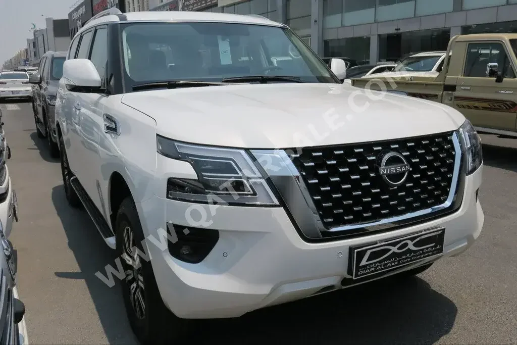 Nissan  Patrol  SE  2023  Automatic  0 Km  6 Cylinder  Four Wheel Drive (4WD)  SUV  White  With Warranty