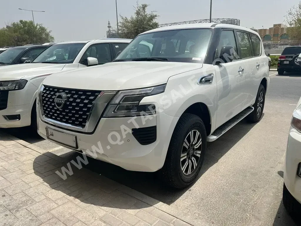 Nissan  Patrol  XE  2023  Automatic  0 Km  6 Cylinder  Four Wheel Drive (4WD)  SUV  White  With Warranty