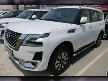 Nissan  Patrol  Titanium  2023  Automatic  0 Km  6 Cylinder  Four Wheel Drive (4WD)  SUV  White  With Warranty