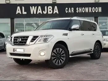 Nissan  Patrol  Platinum  2014  Automatic  160,000 Km  8 Cylinder  Four Wheel Drive (4WD)  SUV  White  With Warranty