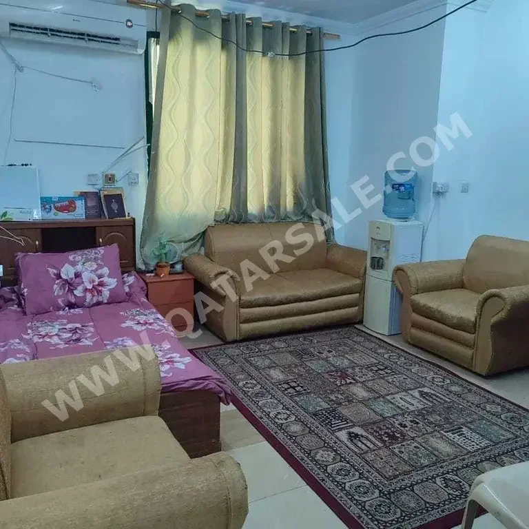 Labour Camp 1 Bedrooms  Apartment  For Rent  in Doha -  Rawdat Al Khail  Fully Furnished