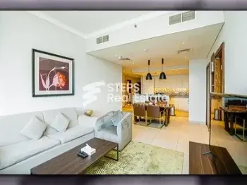 2 Bedrooms  Apartment  For Rent  in Doha -  The Pearl  Fully Furnished