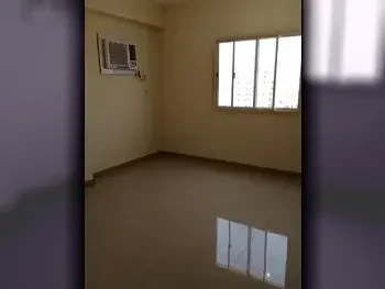 2 Bedrooms  Apartment  For Rent  in Doha -  Al Mansoura  Not Furnished