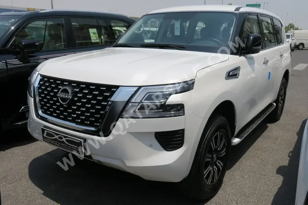 Nissan  Patrol  XE  2023  Automatic  0 Km  6 Cylinder  Four Wheel Drive (4WD)  SUV  White  With Warranty