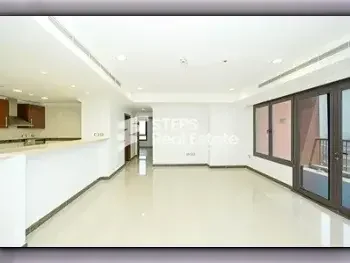 2 Bedrooms  Apartment  For Rent  in Doha -  The Pearl  Semi Furnished