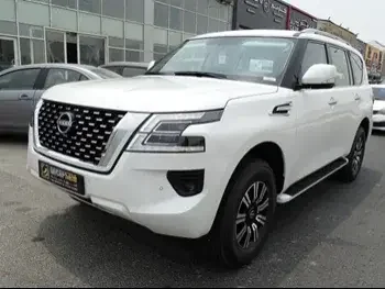 Nissan  Patrol  SE  2023  Automatic  0 Km  6 Cylinder  Four Wheel Drive (4WD)  SUV  White  With Warranty