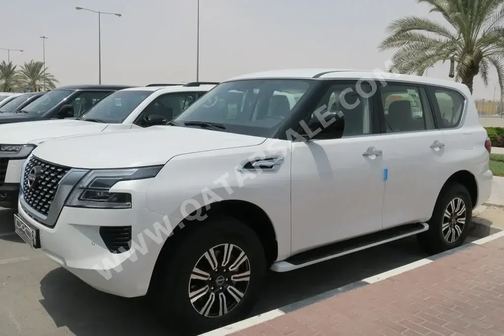 Nissan  Patrol  XE  2023  Automatic  0 Km  6 Cylinder  Four Wheel Drive (4WD)  SUV  White  With Warranty