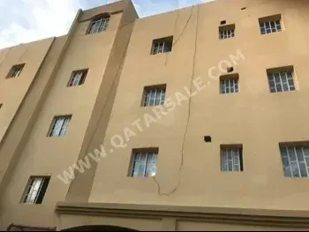 2 Bedrooms  Apartment  For Rent  in Doha -  Madinat Khalifa South  Not Furnished