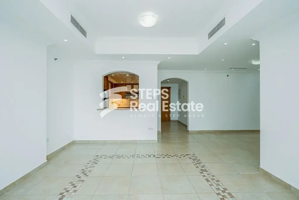 2 Bedrooms  Apartment  For Rent  in Doha -  The Pearl  Semi Furnished