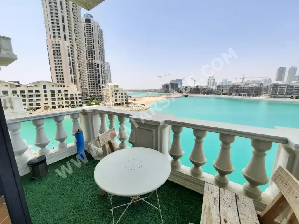 3 Bedrooms  Apartment  For Rent  in Doha -  The Pearl  Fully Furnished