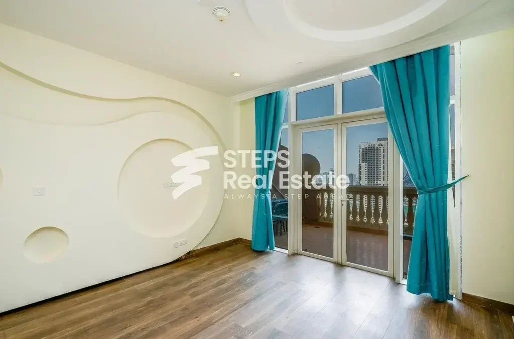 2 Bedrooms  Apartment  For Rent  in Doha -  The Pearl  Semi Furnished