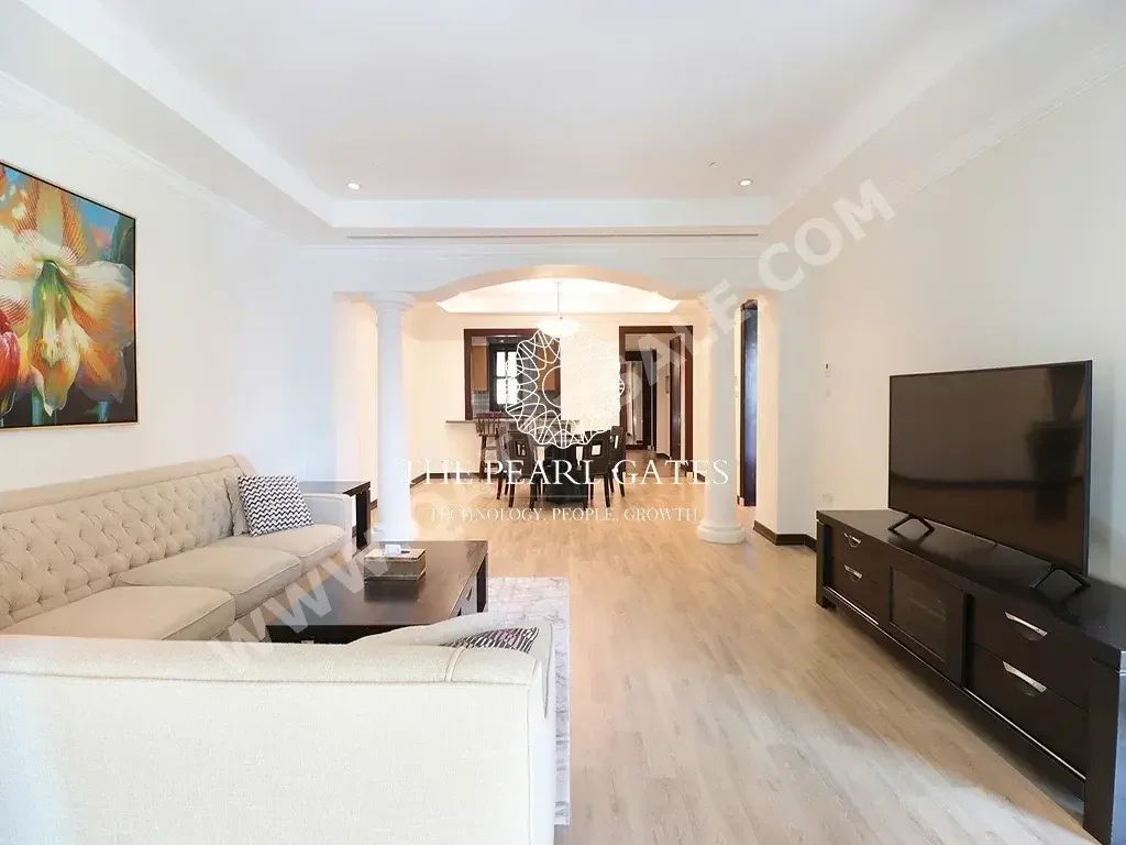 2 Bedrooms  Apartment  For Rent  in Doha -  The Pearl  Fully Furnished