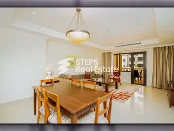 2 Bedrooms  Apartment  For Rent  in Doha -  The Pearl  Fully Furnished