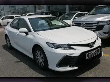 Toyota  Camry  LE  2023  Automatic  0 Km  4 Cylinder  Front Wheel Drive (FWD)  Sedan  White  With Warranty