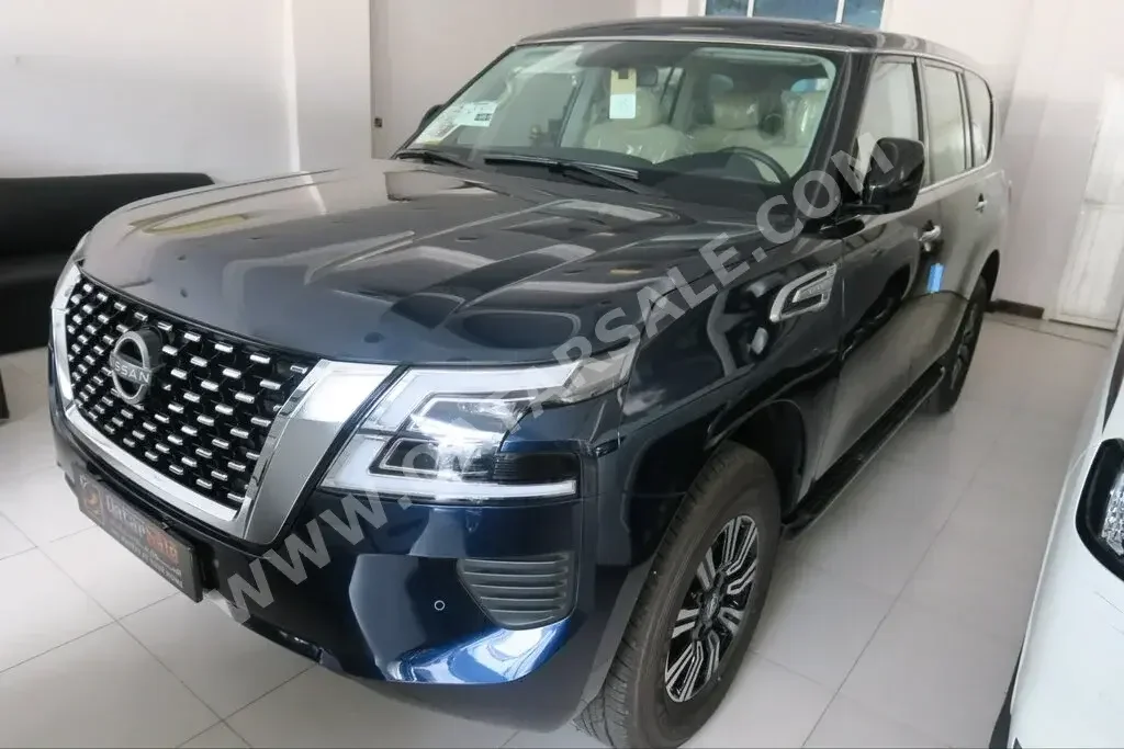 Nissan  Patrol  XE  2023  Automatic  0 Km  6 Cylinder  Four Wheel Drive (4WD)  SUV  Dark Blue  With Warranty