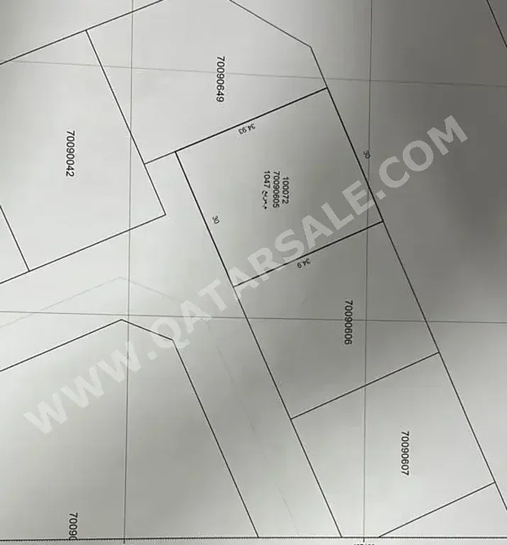 Lands For Sale in Al Daayen  - Al Khisah  -Area Size 1,047 Square Meter