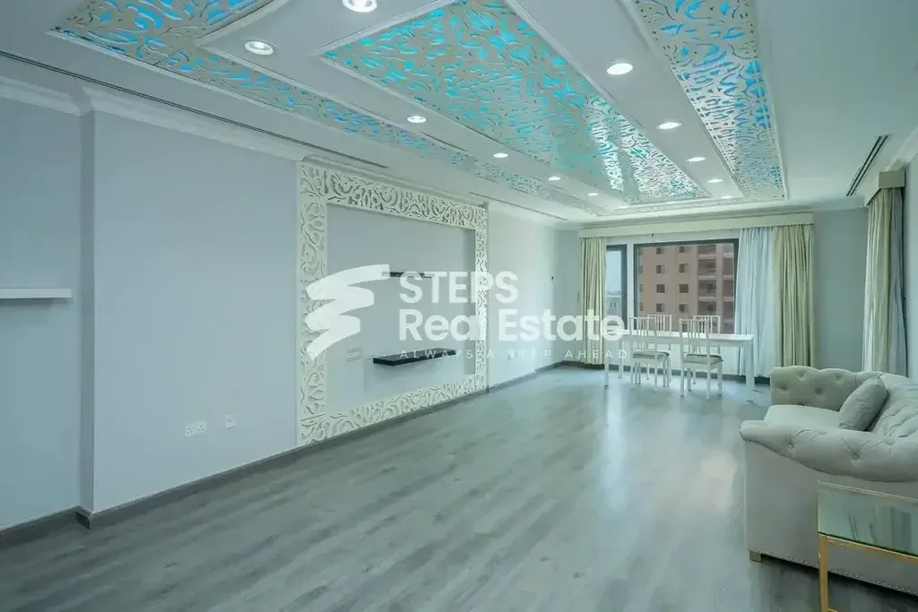 2 Bedrooms  Apartment  For Rent  in Doha -  The Pearl  Semi Furnished