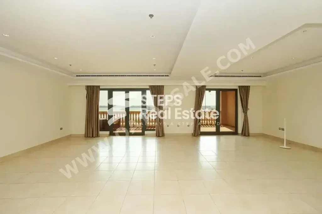 2 Bedrooms  Apartment  For Rent  in Doha -  The Pearl  Semi Furnished