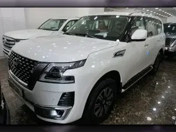 Nissan  Patrol  Titanium  2023  Automatic  0 Km  6 Cylinder  Four Wheel Drive (4WD)  SUV  White  With Warranty