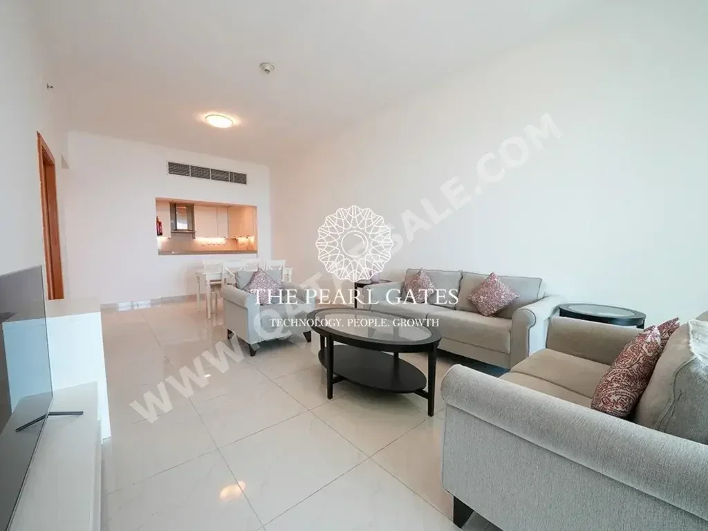 2 Bedrooms  Apartment  For Rent  in Doha -  The Pearl  Fully Furnished