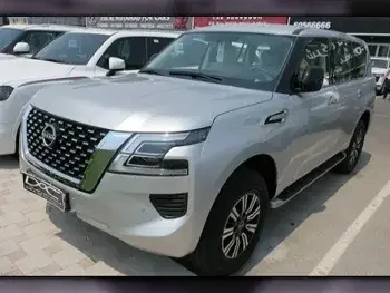 Nissan  Patrol  XE  2023  Automatic  0 Km  6 Cylinder  Four Wheel Drive (4WD)  SUV  Silver  With Warranty