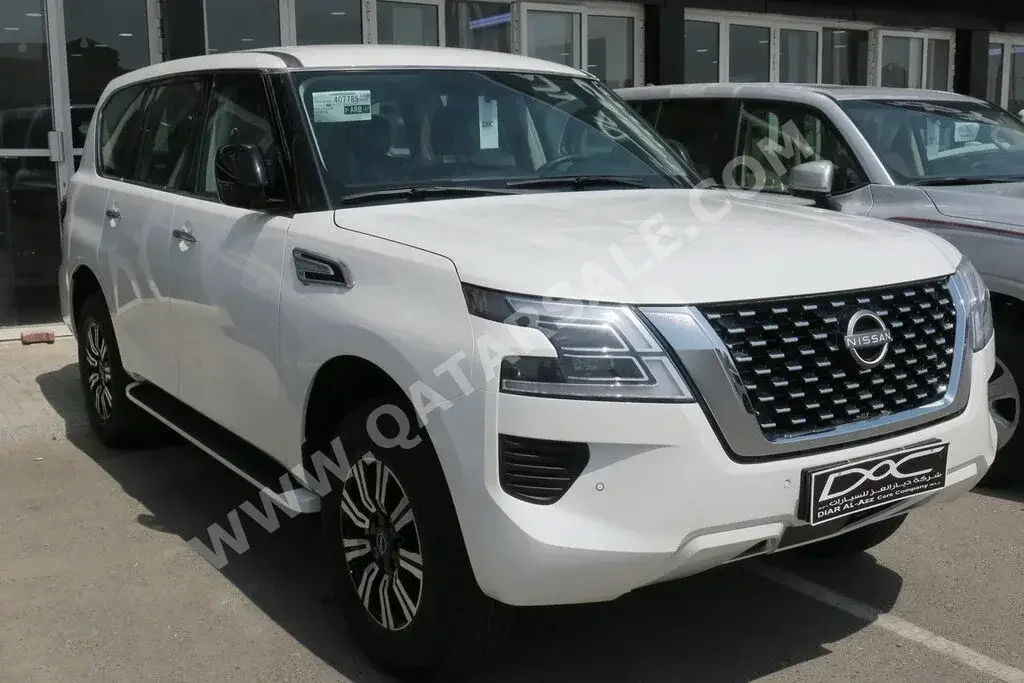 Nissan  Patrol  XE  2023  Automatic  0 Km  6 Cylinder  Four Wheel Drive (4WD)  SUV  White  With Warranty