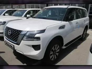 Nissan  Patrol  XE  2023  Automatic  0 Km  6 Cylinder  Four Wheel Drive (4WD)  SUV  White  With Warranty