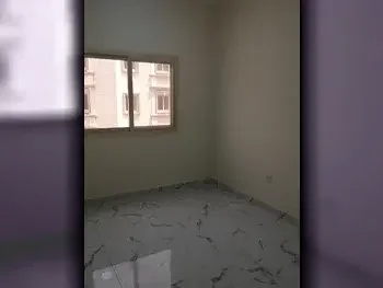 2 Bedrooms  Apartment  For Rent  in Doha -  Al Mansoura  Not Furnished